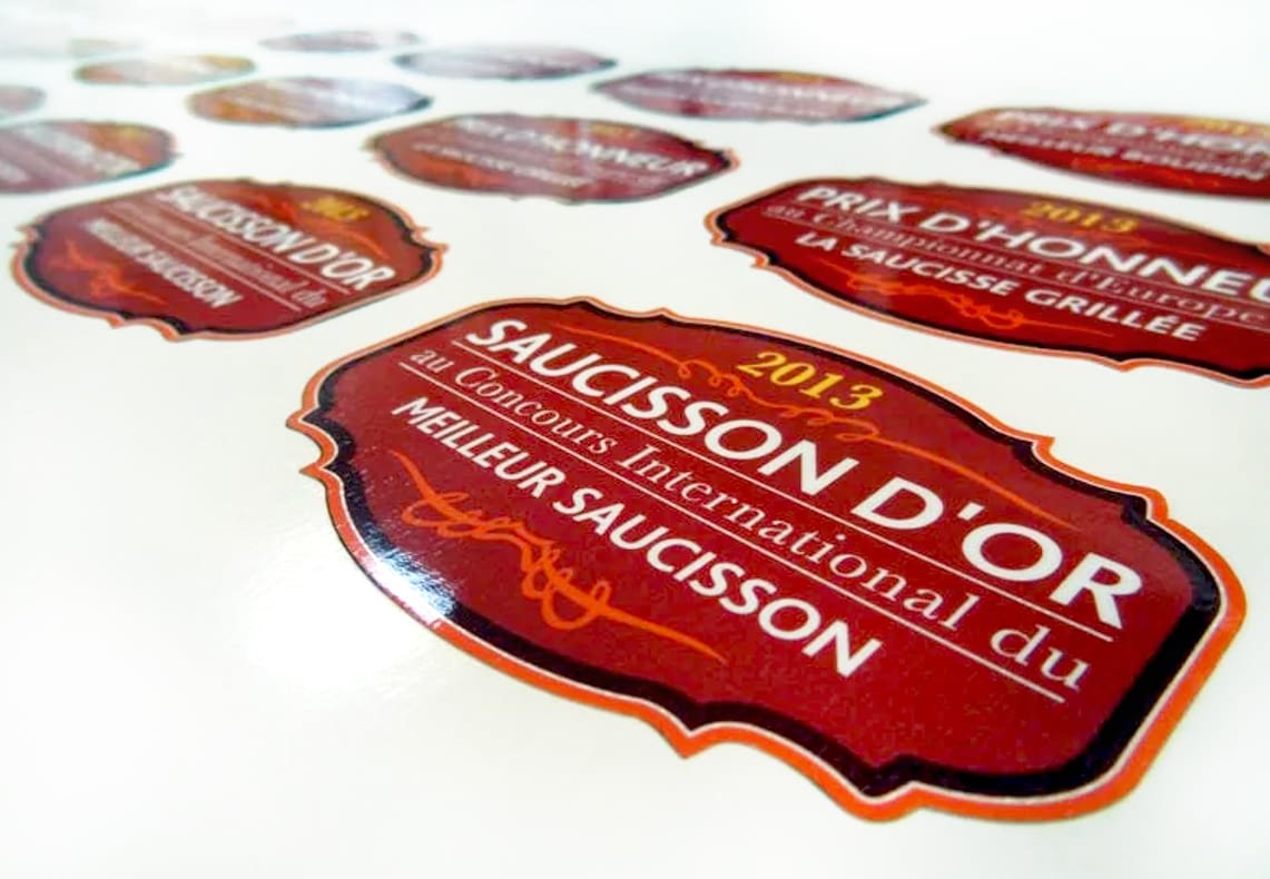 Autocollants dôming en relief Saucisson d’Or imprimés à Vitré